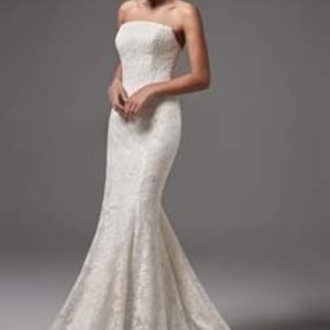 Beautiful Sottero & Midgley Linley size 14 ivory. Dress has never been altered